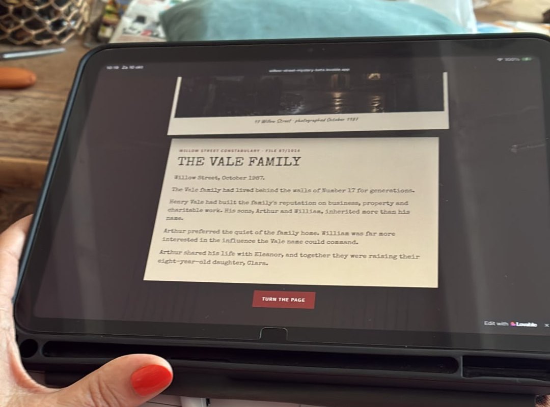 Photo of the game running in a browser on a tablet, showing the Vale family file